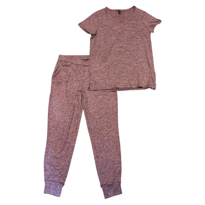 Red pajama set with top and pants on a white background