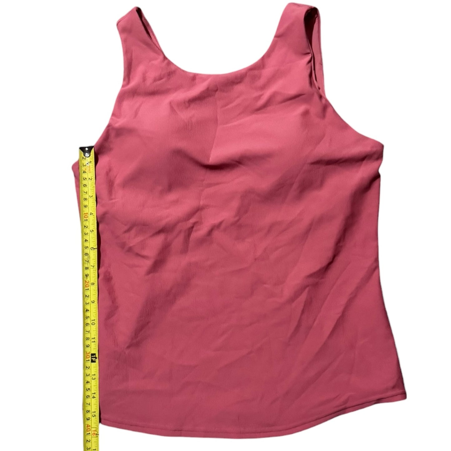 tank top with a measuring tape on a white background