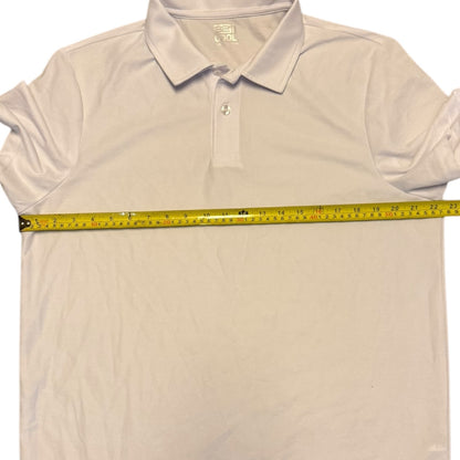 polo shirt with a measuring tape across it on a white background
