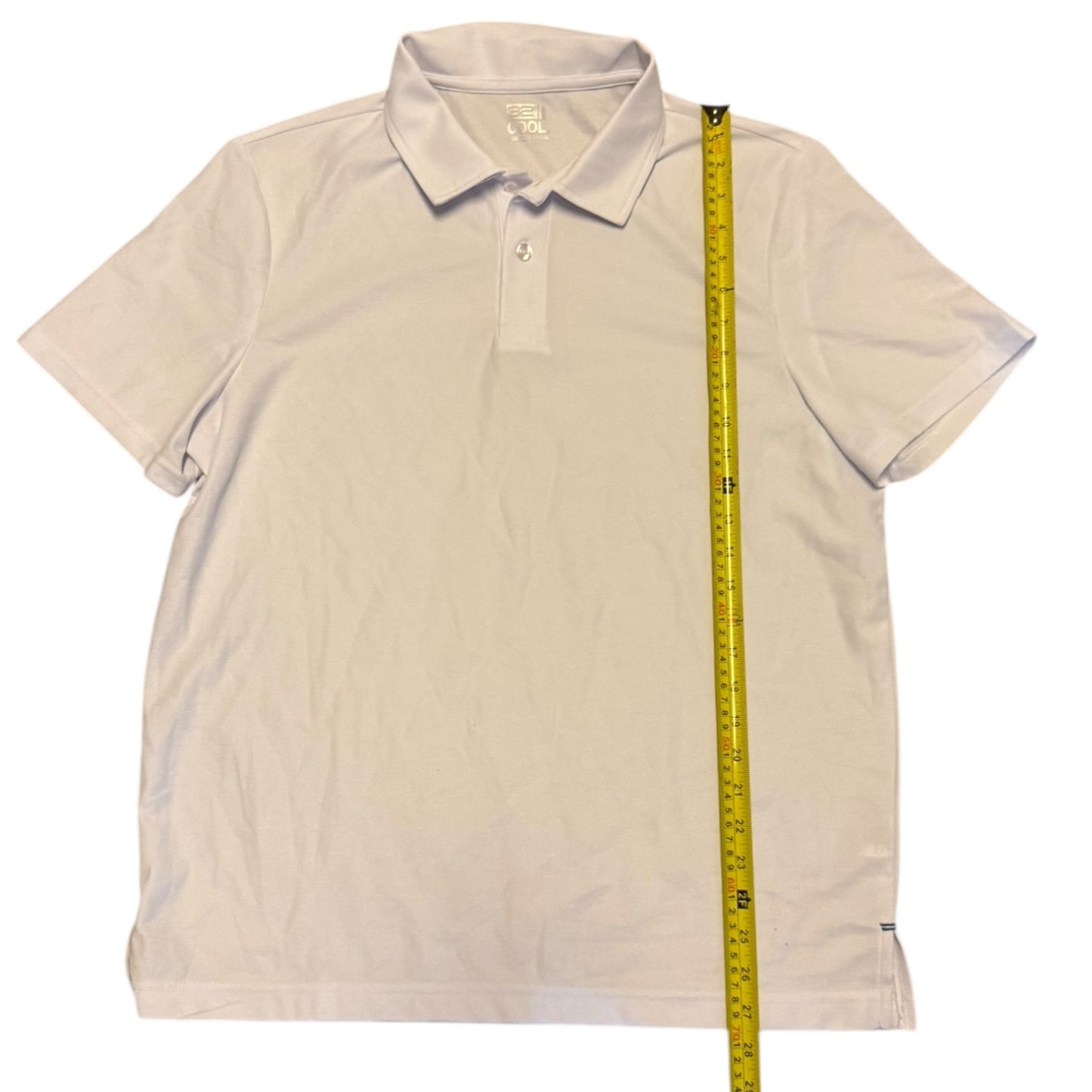 polo shirt with a measuring tape displayed on a white background