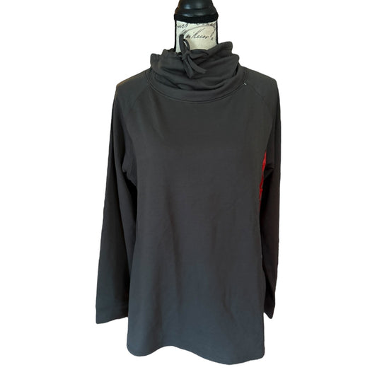 Green long-sleeve top with cowl neck on a white background