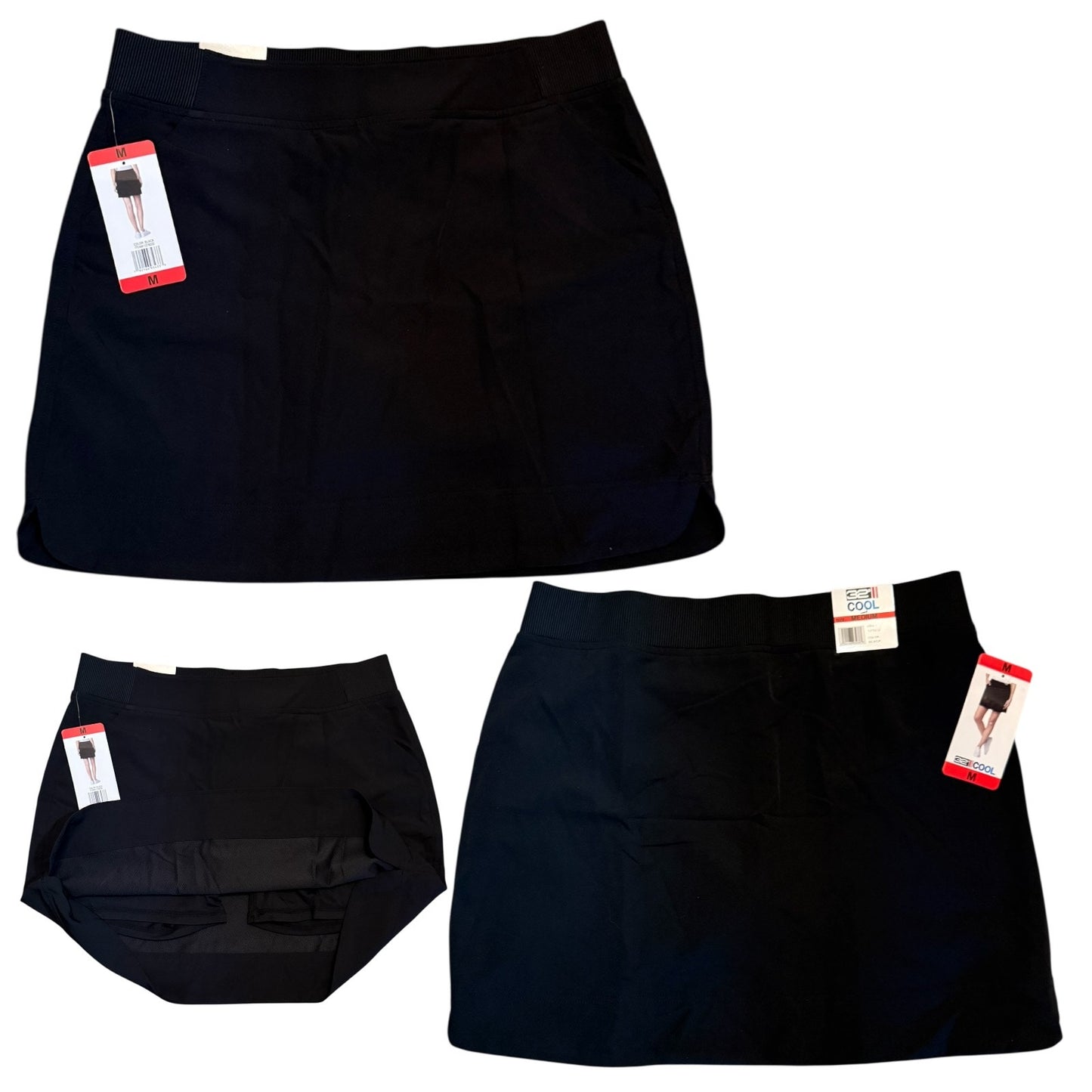 Black skort with tags on a white background