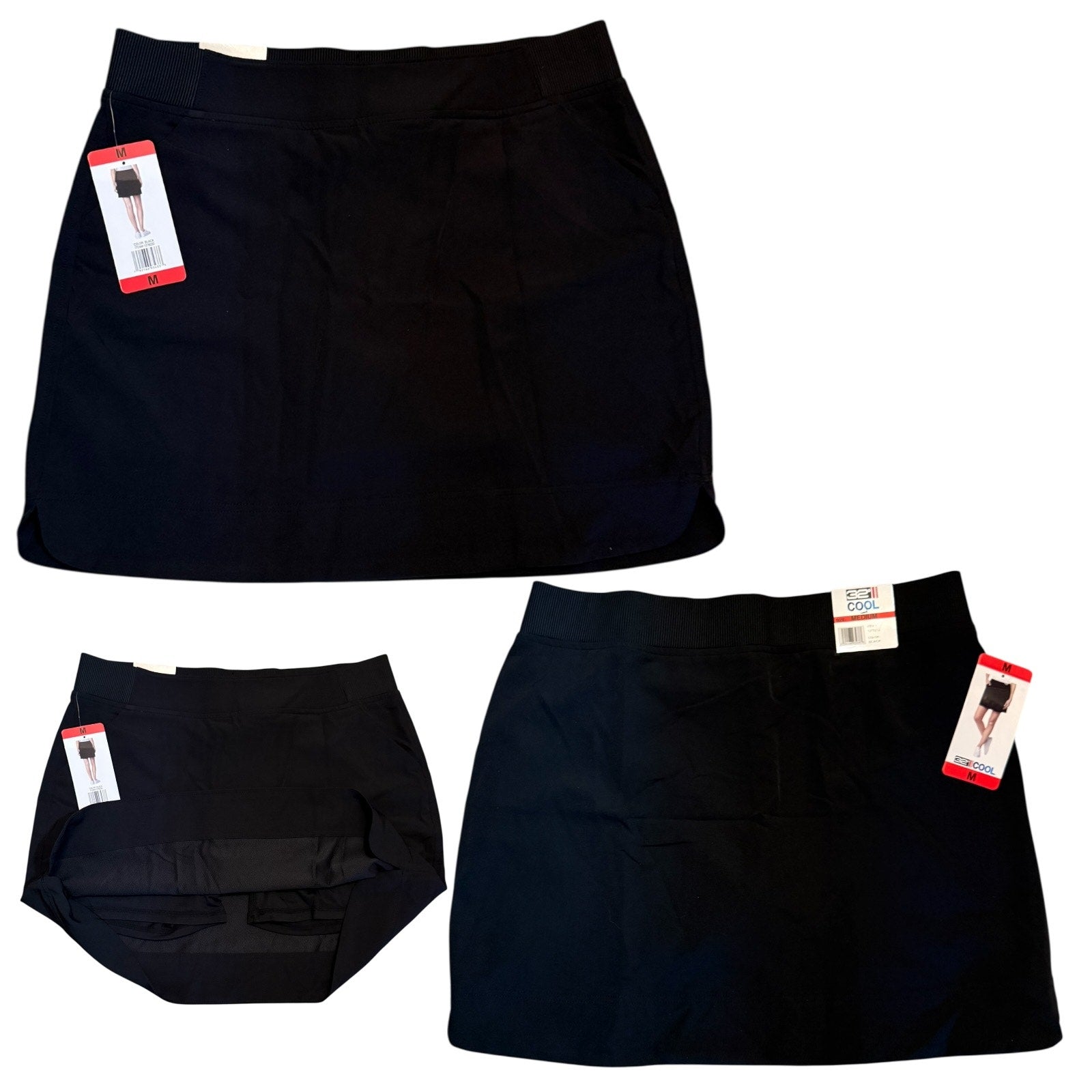 Black skort with tags on a white background