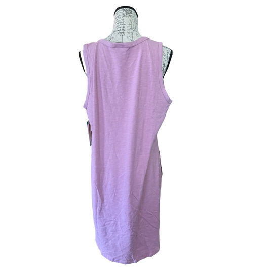 Pink sleeveless dress on a mannequin against a white background