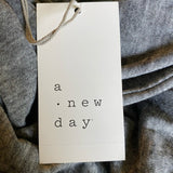 Tag on gray shirt