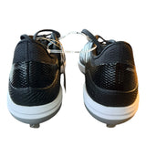 Black and white golf shoes on a white background back view