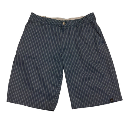 Front of gray pinstripe shorts on a white background