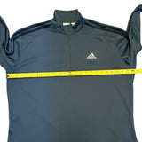 Gray Adidas pullover with a yellow measuring tape across it on a white background