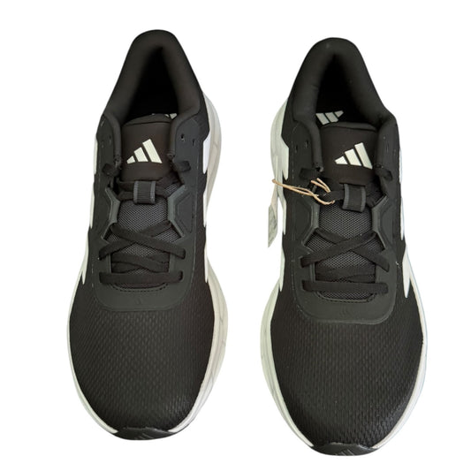 A pair of Adidas running shoes in black and white, shown from the front on a solid white background.