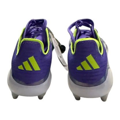 Back of Purple soccer cleats with green accents on a white background