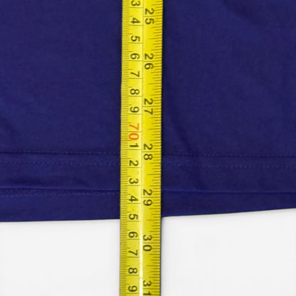 Yellow measuring tape on a purple fabric background