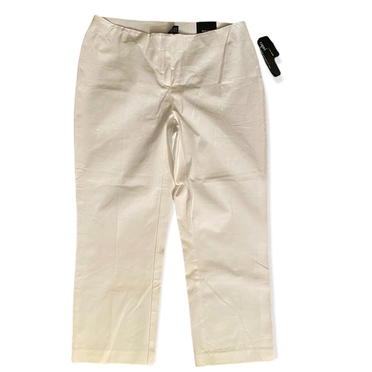 A pair of white cropped trousers laid flat on a white background, with a black hangtag attached near the waistband.