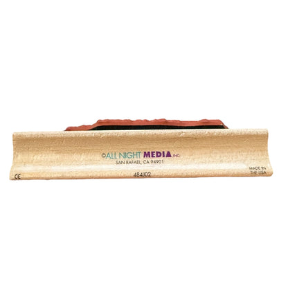 Wooden product with 'All Night Media' branding on a white background