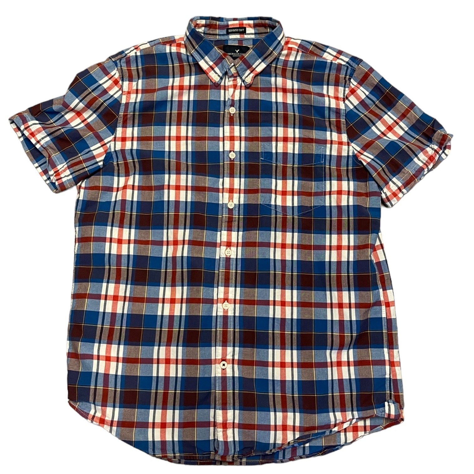 Plaid short sleeve shirt laying flat on a white background
