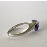 Side of purple silver ring
