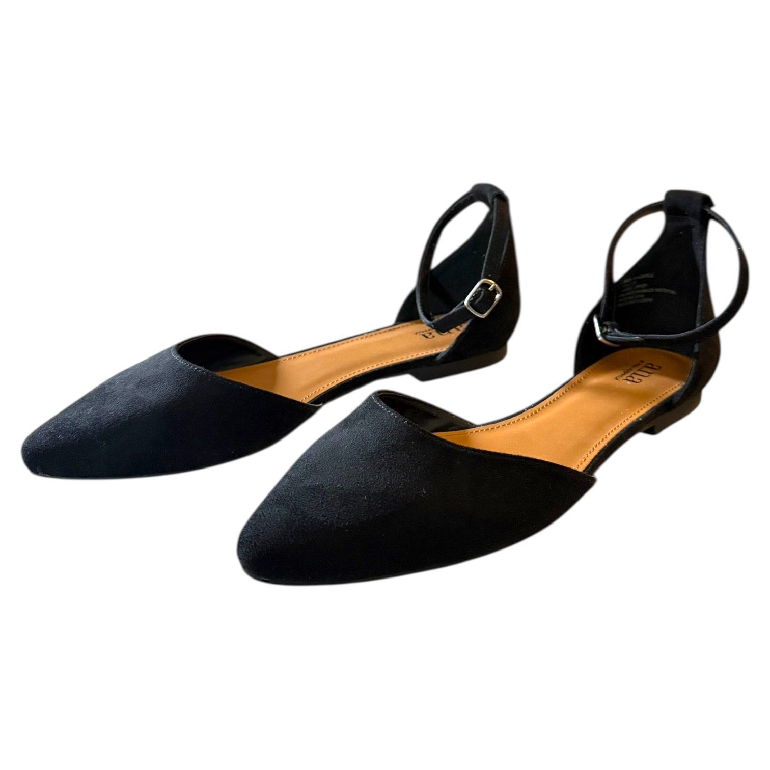 A pair of black pointed-toe flat shoes with ankle straps and buckle details, shown on a plain white background.