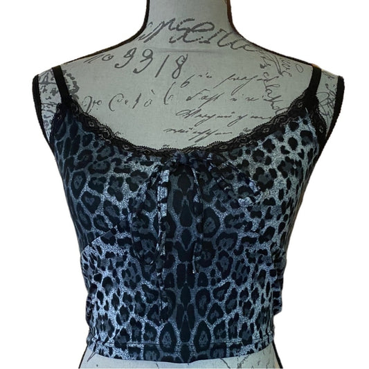 Front of Leopard print top on a mannequin with a white background