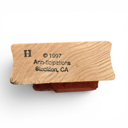 Wooden stamp with text on a white background