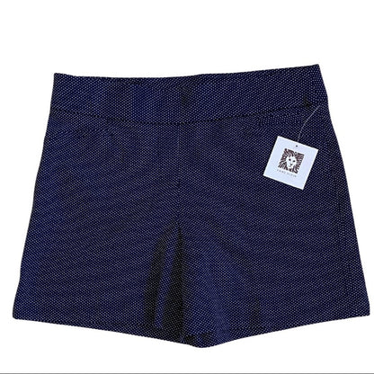 Navy blue shorts with a brand tag on a white background