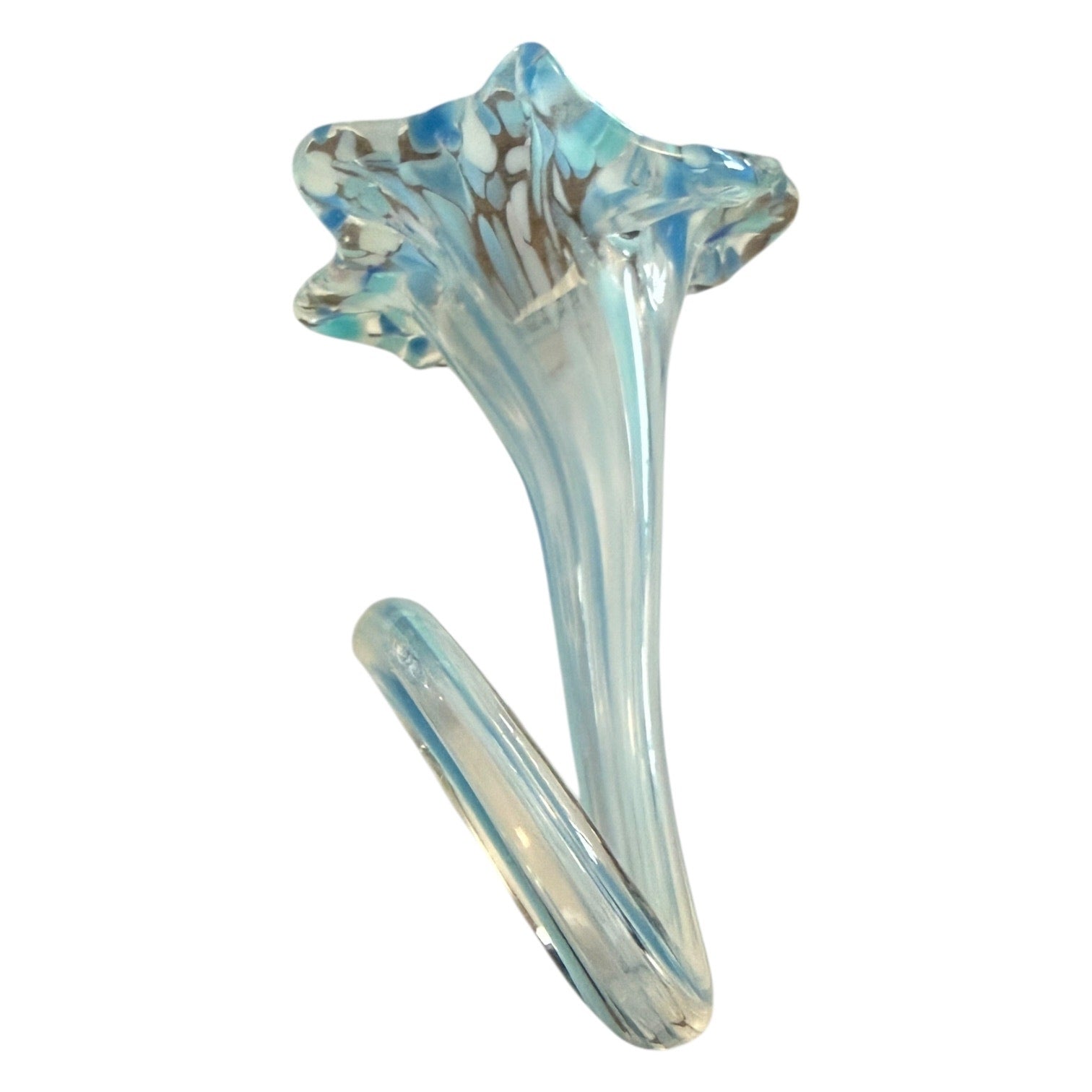 Glass flower with blue and clear patterns on a white background