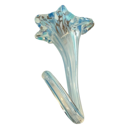 Glass flower with blue and clear patterns on a white background