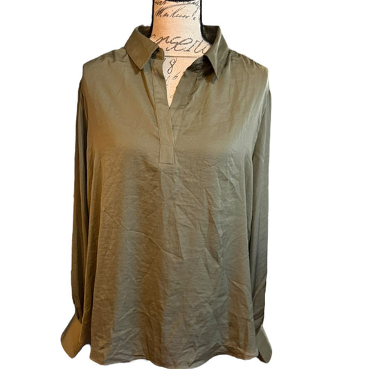An olive green satin V-neck long sleeve shirt by Banana Republic displayed on a mannequin.