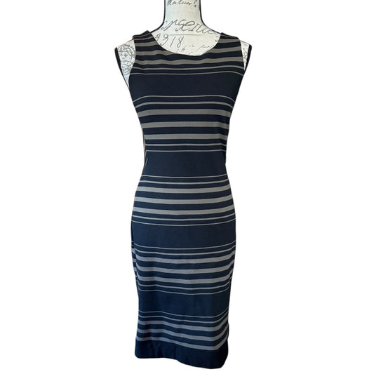 Striped dress on a mannequin against a white background