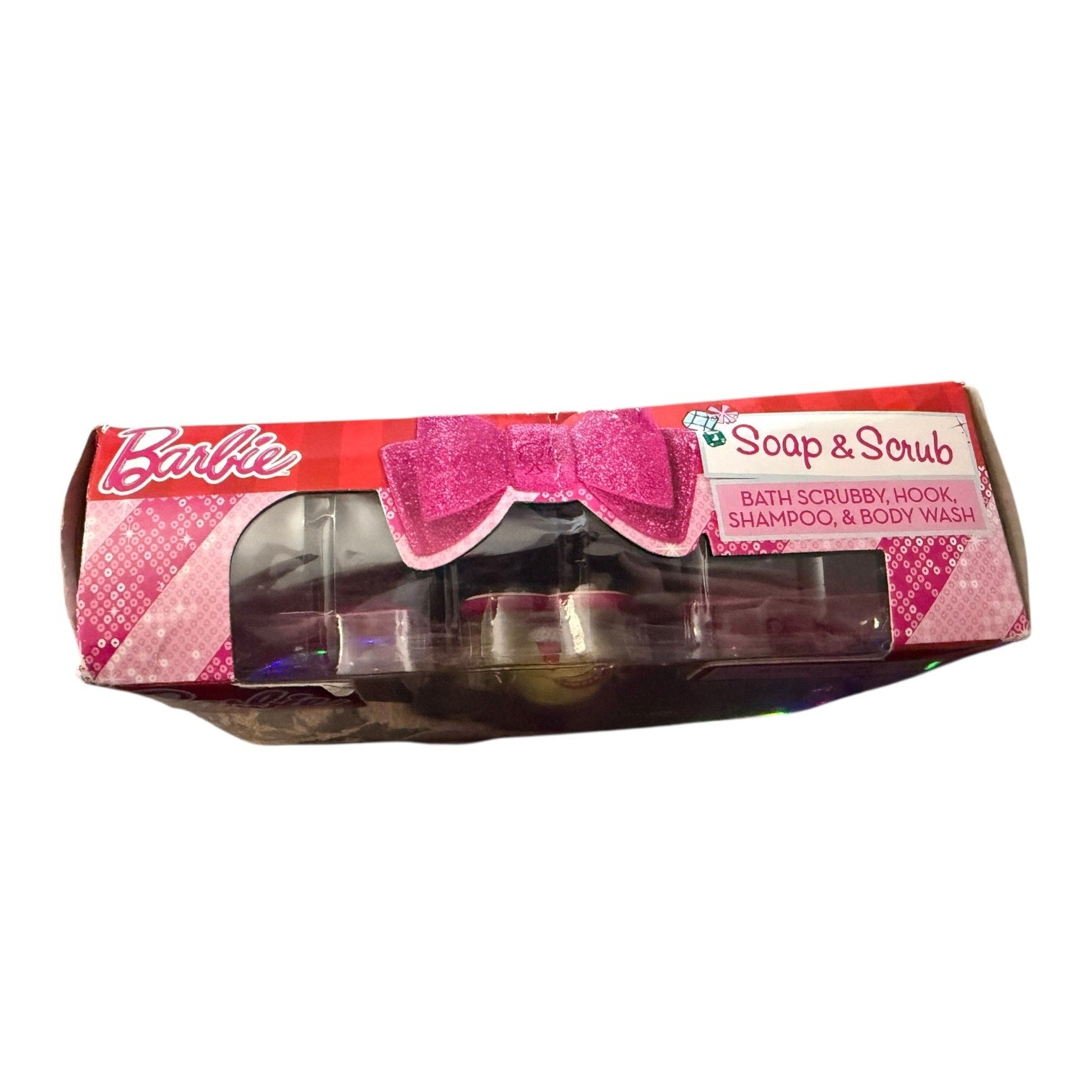 Top view of Barbie Soap & Scrub set packaging with pink bow and brand name on a white background