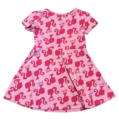 Back of Pink dress with Barbie logo pattern on a white background