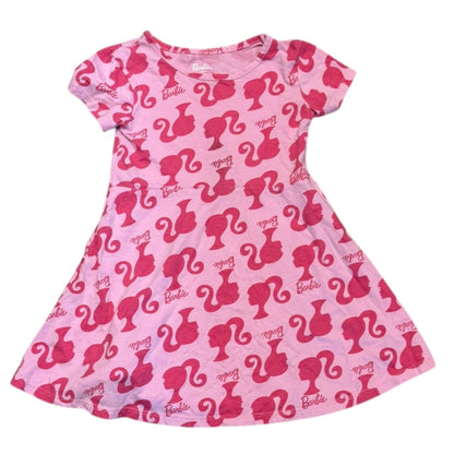 Front of Pink dress with Barbie logo pattern on a white background