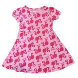 Front of Pink dress with Barbie logo pattern on a white background