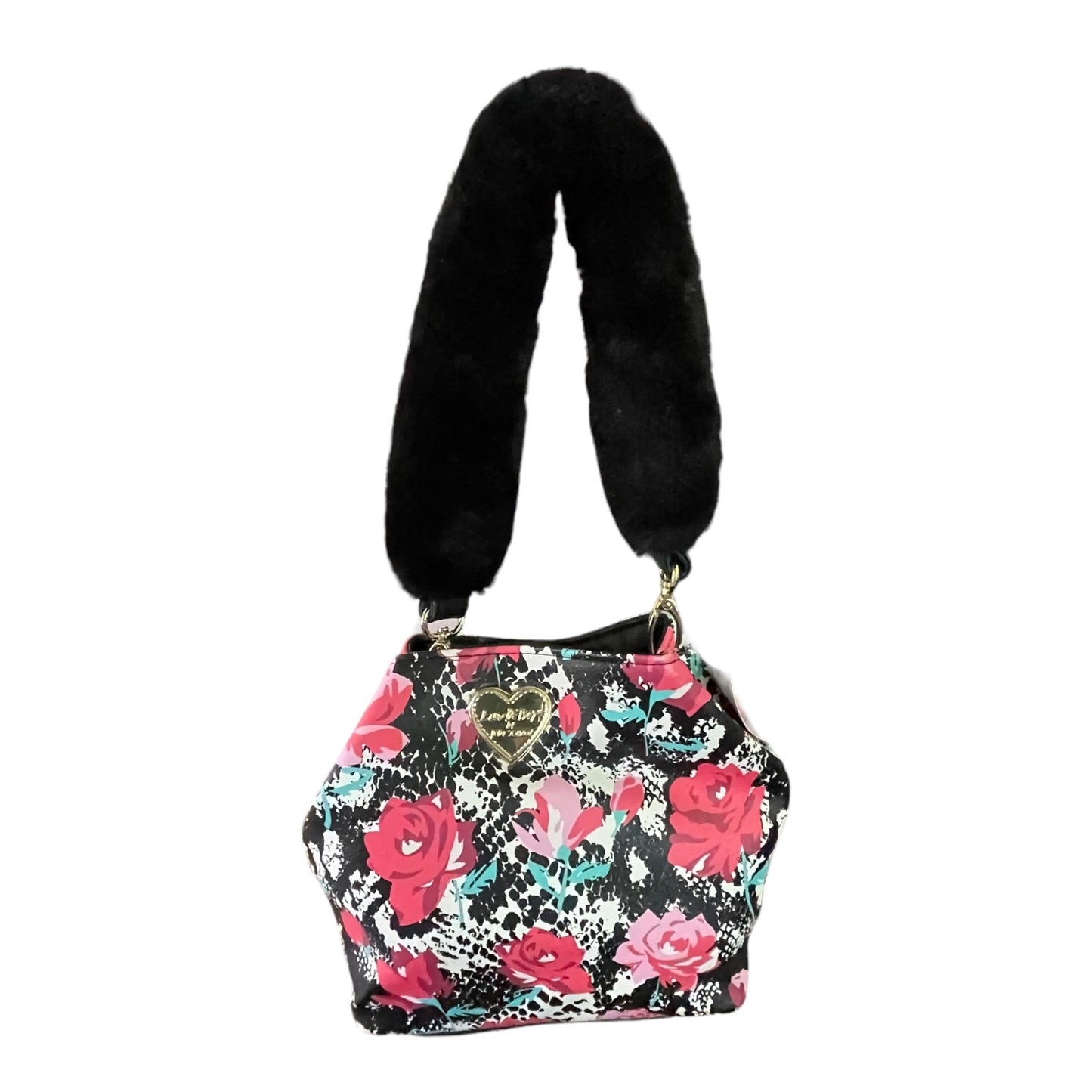A floral shoulder bag with a black faux fur strap, featuring a black decorated with red and pink roses, teal leaves, and a gold heart-shaped logo plate.
