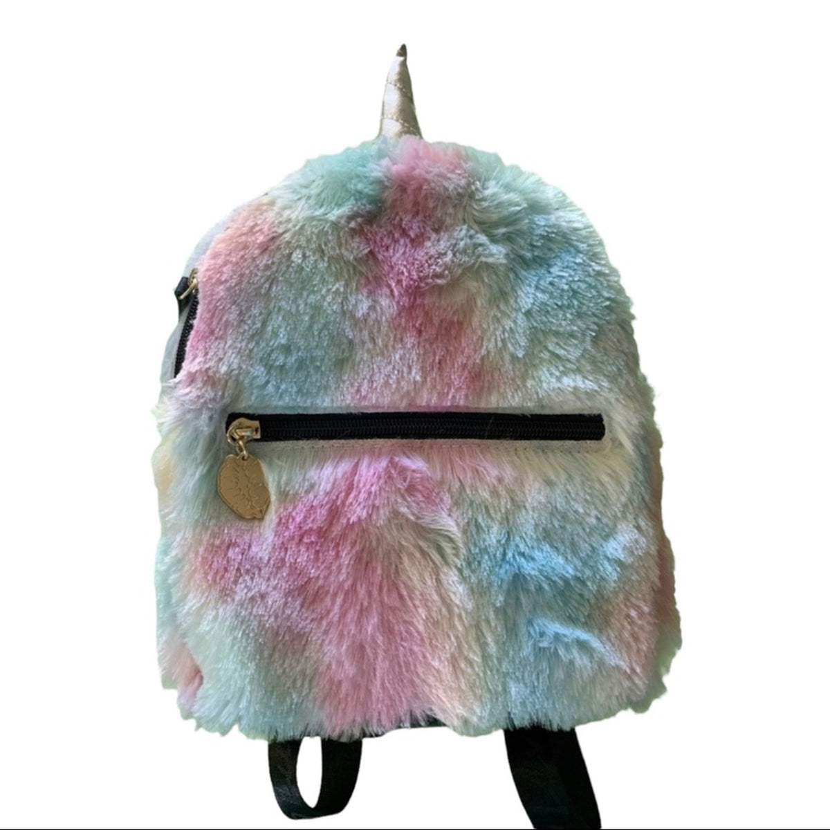 A fuzzy unicorn-themed backpack with pastel pink, blue, and white mottled fur, a silver horn, and black straps on a white background.