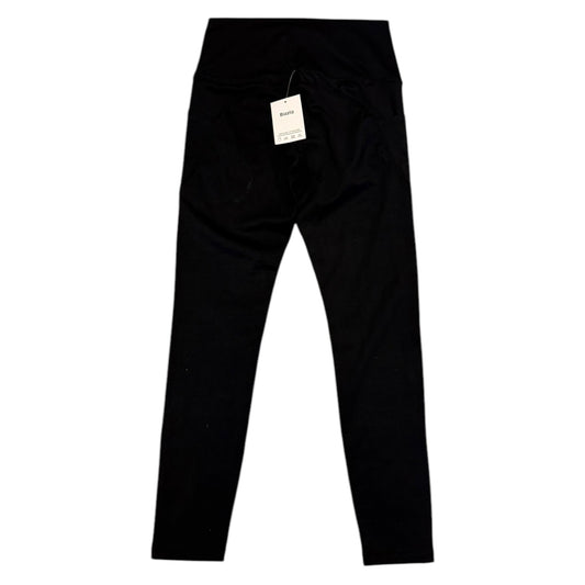 Back of Black leggings with a tag on a white background