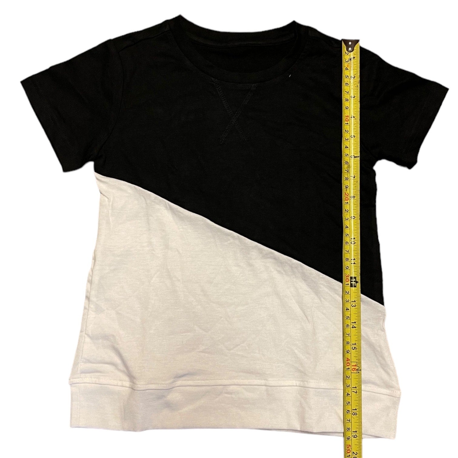 Black and white t-shirt with a measuring tape on a white background