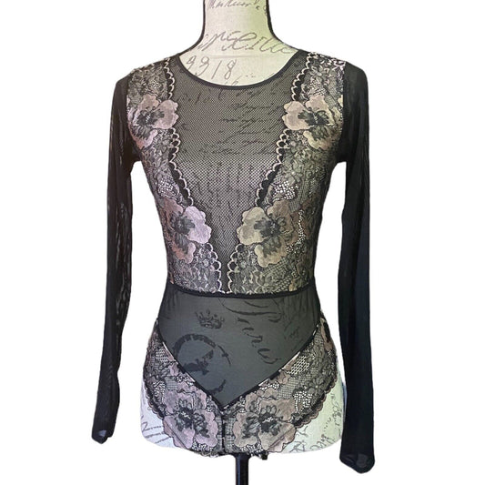 Front of Lace bodysuit with floral patterns on a mannequin against a white background