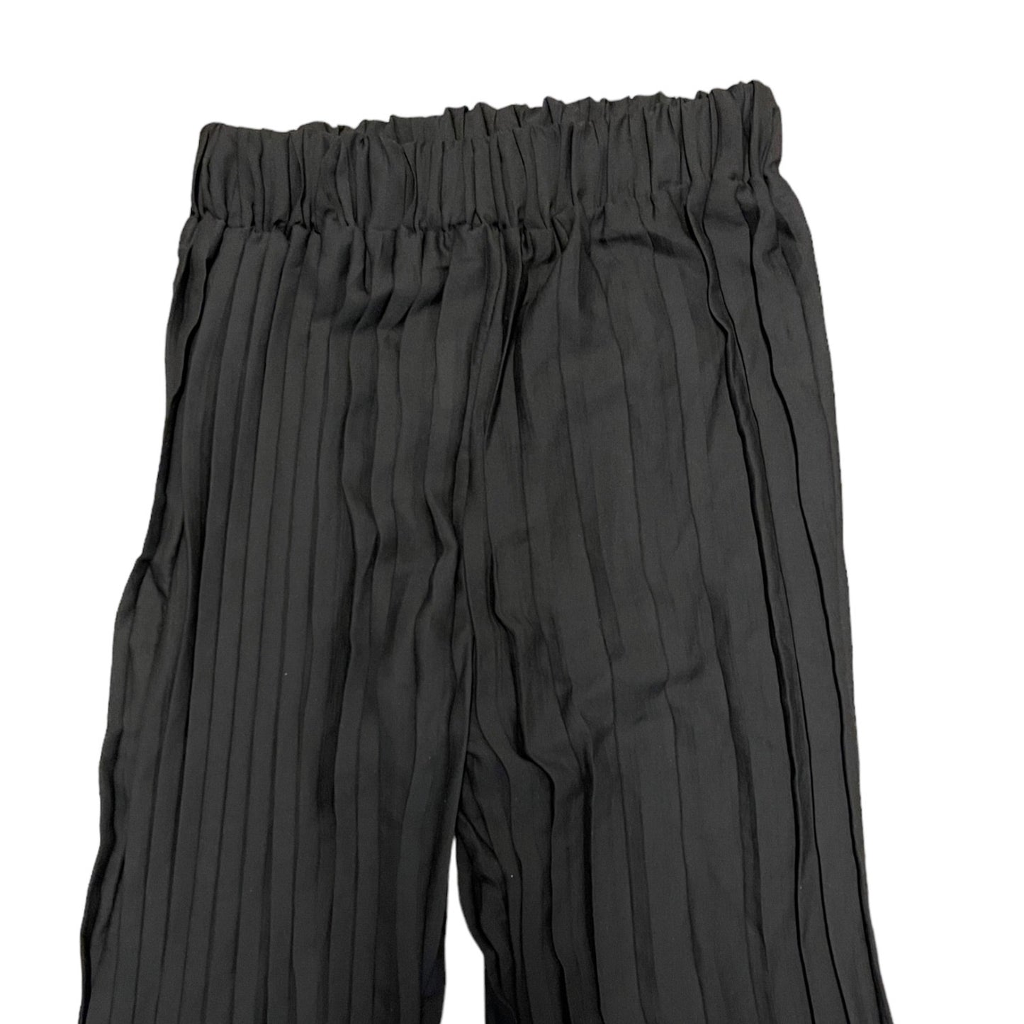 Black pleated cover up pants with an elastic waistband, shown against a plain white background.