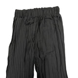 Top of black pleated sheer pants