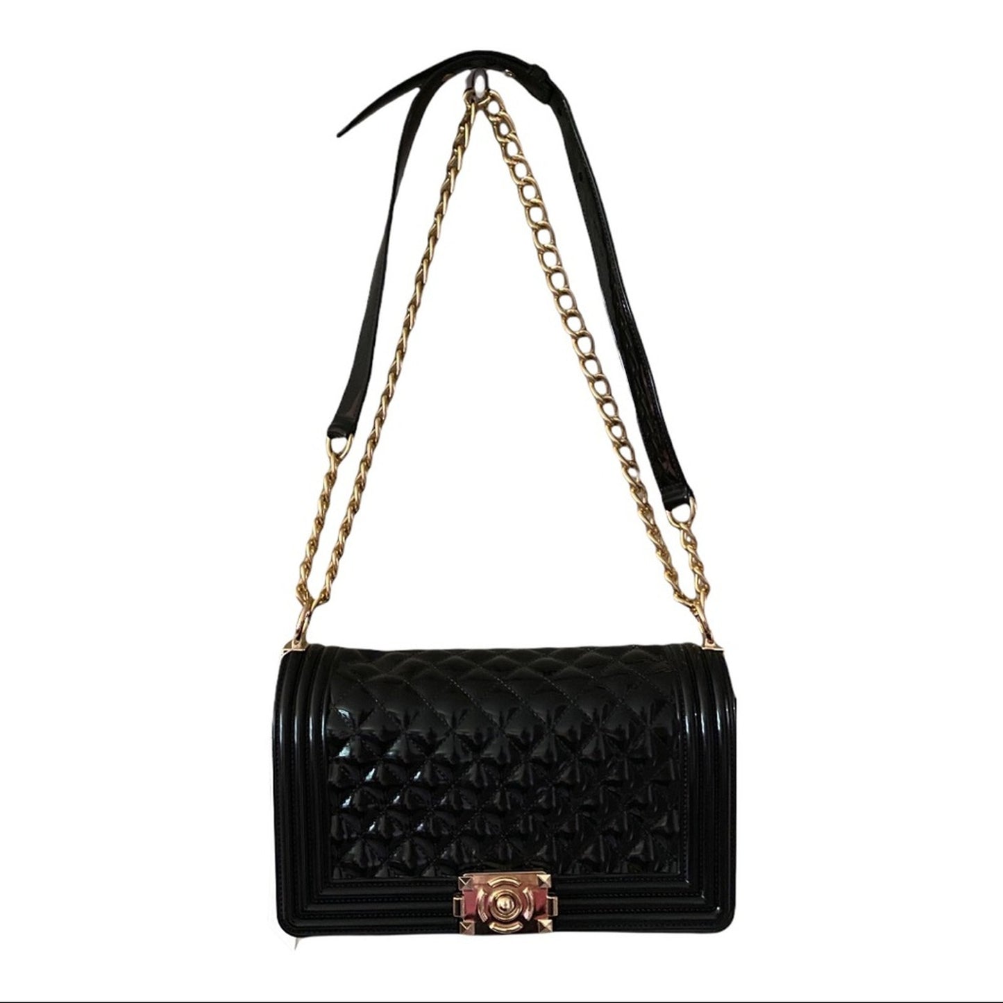 Front of Black quilted handbag with gold chain strap on a white background