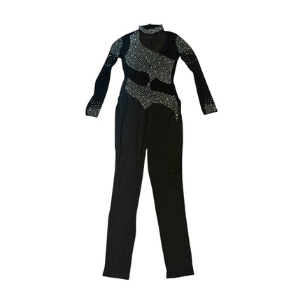Black catsuit laying out with  embellishments on a white background