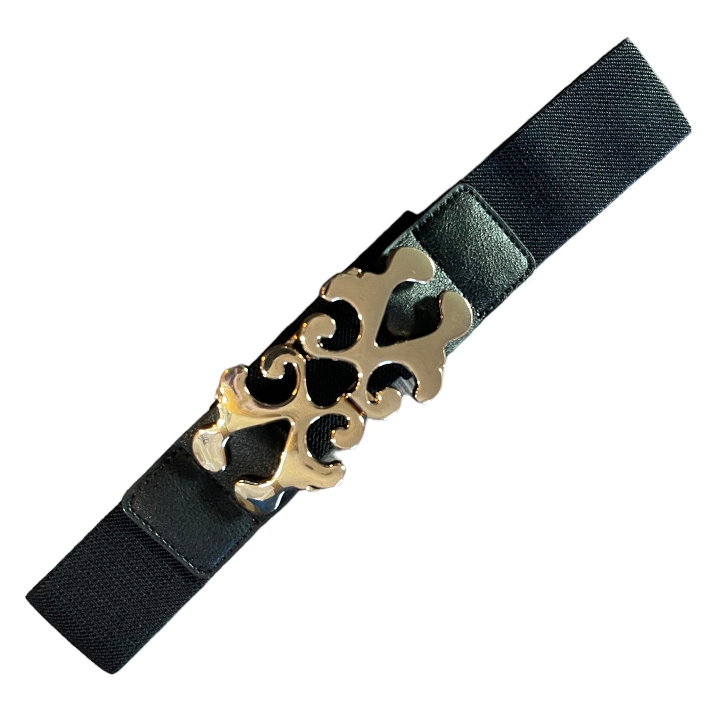A black elastic belt with a large, ornate gold-tone metal buckle featuring a stylized cutout design, shown on a plain white background.