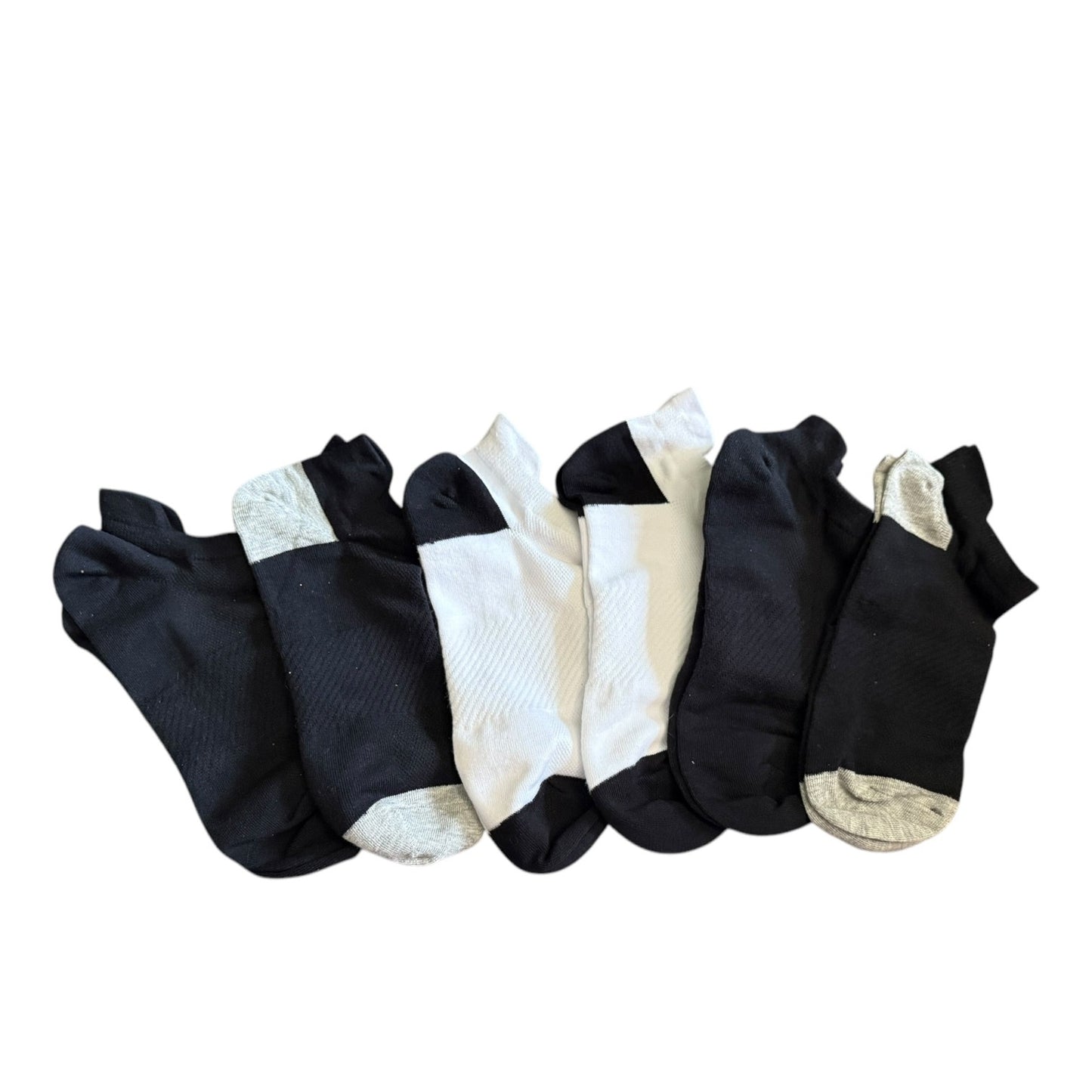 Set of black and white socks on a white background