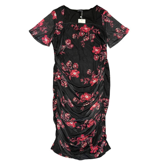 Black dress with red floral pattern on a white background