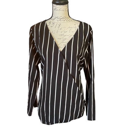 Front of Black and white striped long-sleeve top on a mannequin against a white background