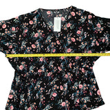 Pit to pit on black floral shirt