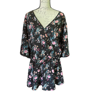 Front of black floral shirt