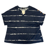 Front of blue shirt laying flat
