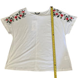 Length of white shirt