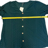 PIt to pit on green shirt