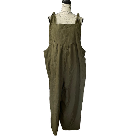 Front of Green overalls on a mannequin against a white background